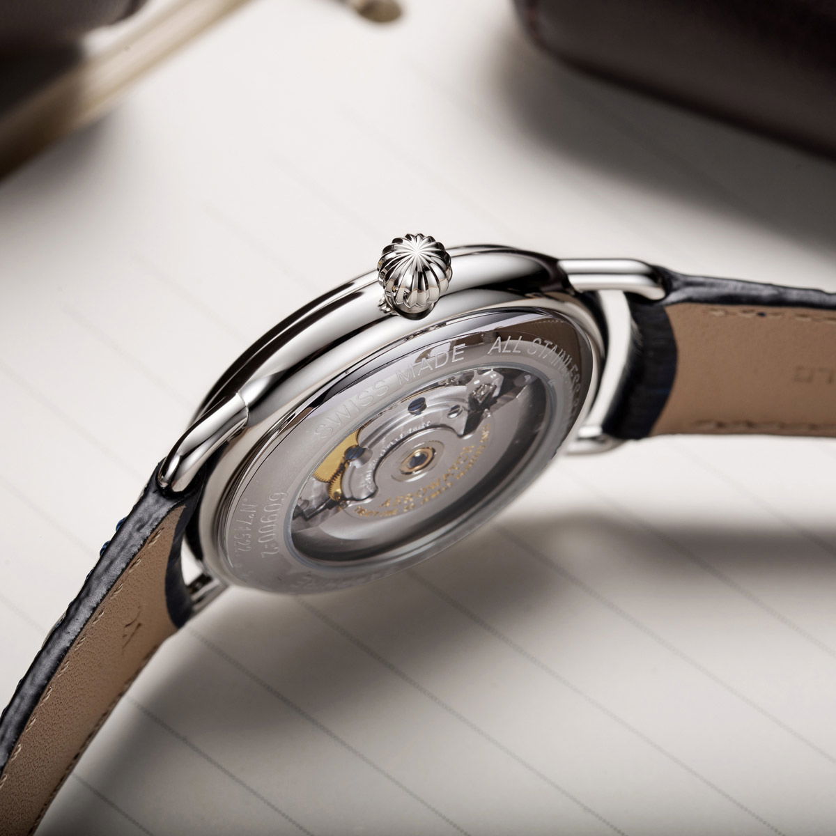 Elegant Aerowatch 1942 Automatic showcasing its intricate back design and luxurious leather strap detail.