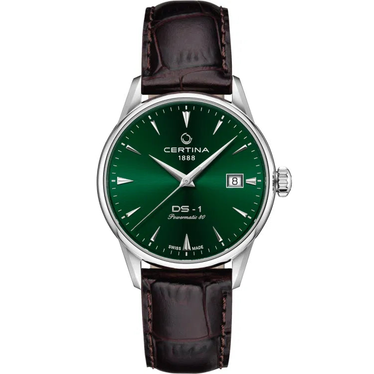 Front view of the Certina DS-1 Powermatic 80 38mm watch with a sunray green dial, silver-tone dauphine hands, and triangular indices. The dial features the Certina logo with '1888' at 12 o’clock, 'DS-1 Powermatic 80' above 6 o’clock, and 'SWISS MADE' at the bottom. A date window at 3 o’clock displays '8'. The stainless steel case is paired with a brown leather strap with an alligator pattern and visible stitching.