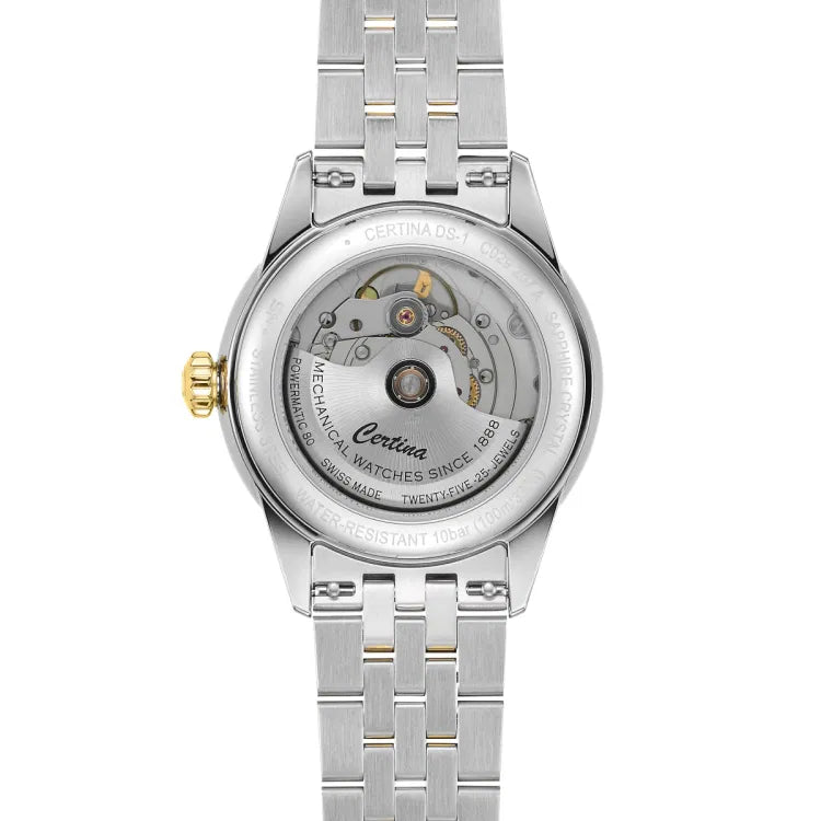 Back view of the Certina DS-1 Powermatic 80 38mm watch, showing its transparent case back with the automatic movement. The engraved rotor displays 'Certina,' 'Mechanical Watches Since 1888,' 'Powermatic 80,' 'Swiss Made,' and 'Twenty-Five 25 Jewels.' The outer ring is engraved with 'CERTINA DS-1,' 'Sapphire Crystal,' and 'Water-Resistant 10bar (100m).' The gold-tone ridged crown is on the left, and the stainless steel bracelet has gold-tone accents.