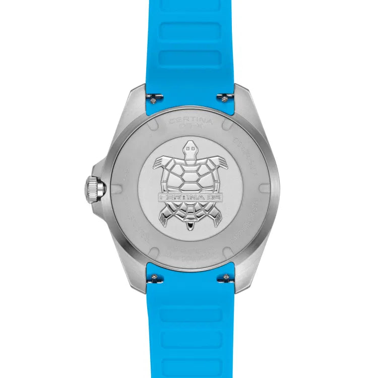 Caseback of Certina DS-X GMT C047.452.17.011.00 featuring embossed turtle emblem, stainless steel finish, and blue rubber strap – Swiss Made quartz travel watch.