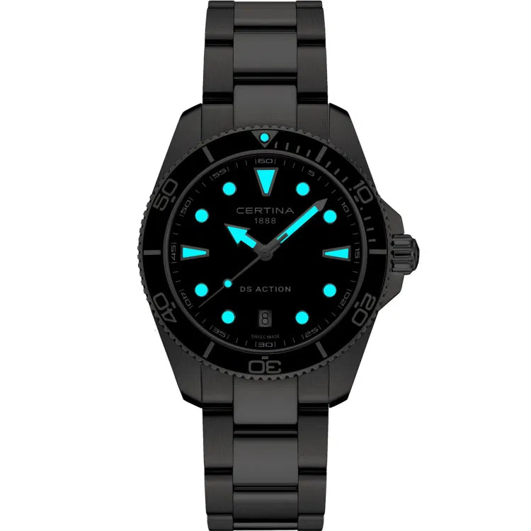 Front view of the Certina DS Action 40mm in a dark setting, showcasing its luminous Super-LumiNova® markers and hands glowing blue against a black dial. The unidirectional bezel with a dive scale, screw-down crown, and stainless steel bracelet complete its sleek, tactical look.