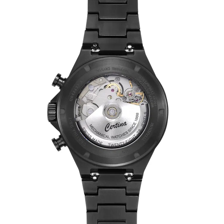 Rear view of Certina DS-7 Chrono Auto with see-through case back revealing the VALJOUX A05.231 automatic movement. Engravings include “Certina”, “Mechanical Watches Since 1888”, “TWENTY-EIGHT 28 JEWELS”, and “SWISS MADE”. Black titanium case and bracelet