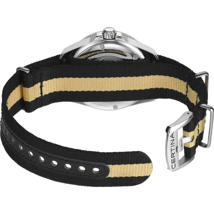 Rear angled view of the Certina DS Action Diver 40.5mm watch showing the black and beige striped NATO strap with stainless steel buckle engraved with “CERTINA.” The case back is partially visible beneath the strap, with part of the reference number “C048.407” seen near the edge.