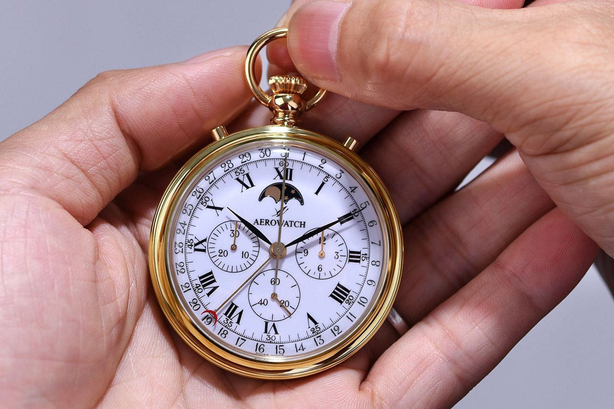 Aerowatch Lépine Mechanical swiss pocket watch 69681 J101 held in hand showing scale and gold-plated open-faced dial